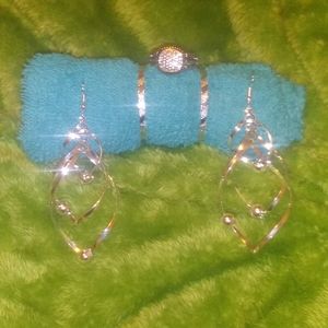Jessica Simpson earrings and ring
